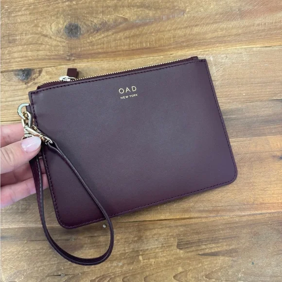 OAD New York burgundy leather wristlet NWOT
